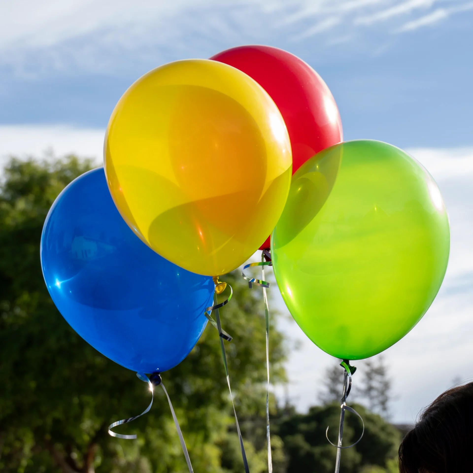 Colorful balloons against the sky
